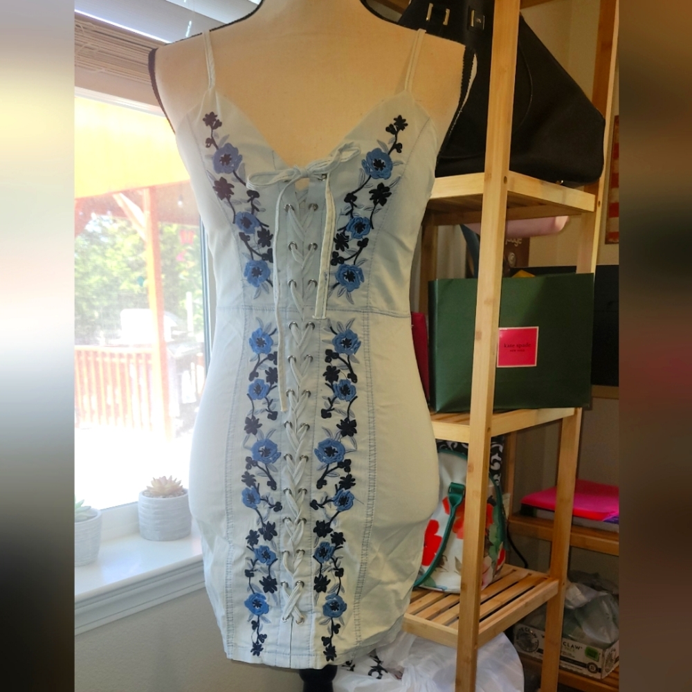 36 point 5 dress. Lace up front. Form fitting.